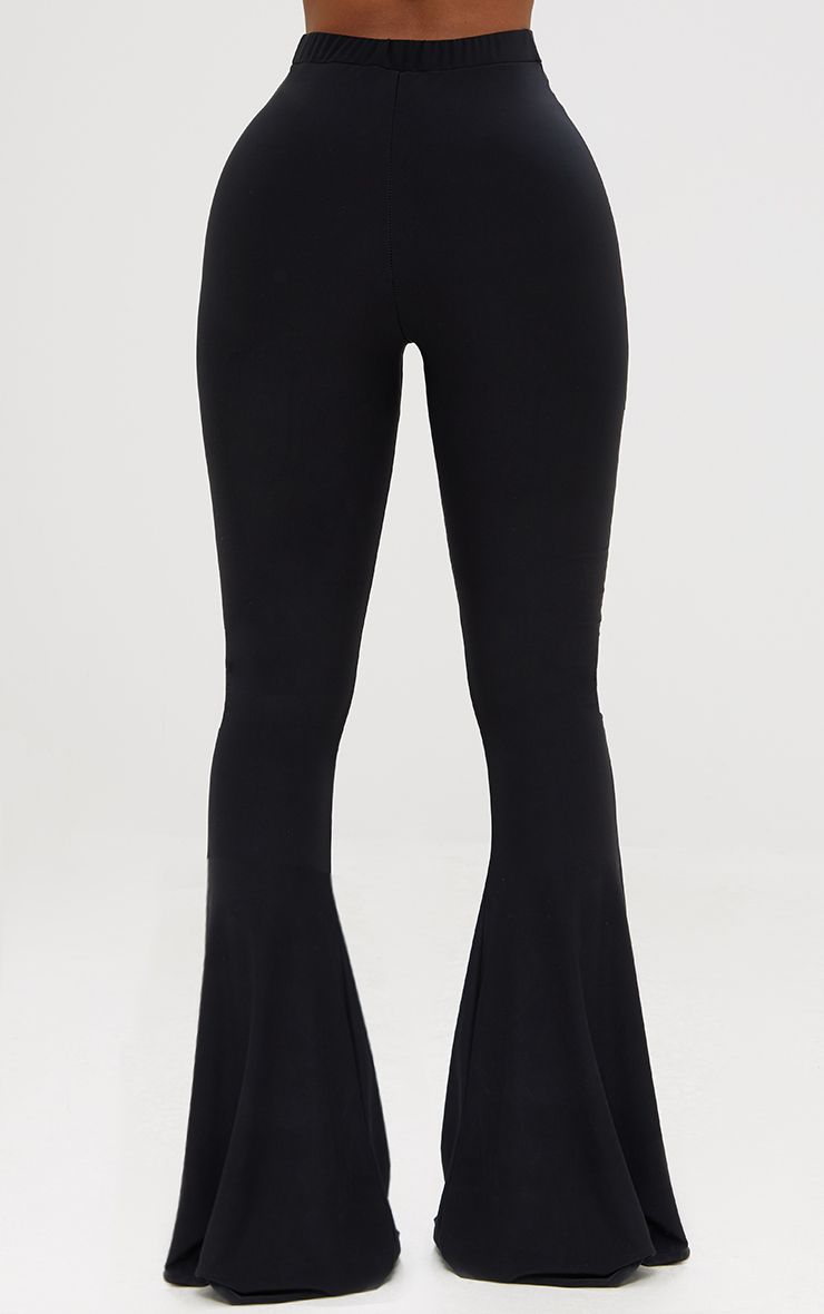 Shape Black Slinky Flared Leg Trousers. PLT Shape | PrettyLittleThing USA